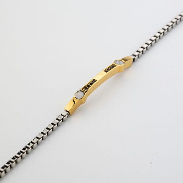 Bracciale boccadamo uomo ABR807D a maglia veneziana con piastra centrale placcata oro giallo con zirconi neri e dettagli di viti a testa piatta incastonati