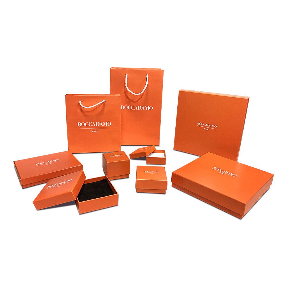 Bracciale rigido placcato oro giallo con quadrati in pavè di zirconi XB1047D