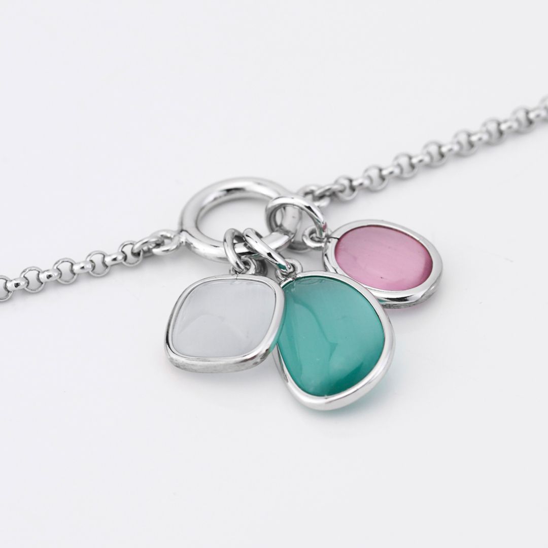 Bracciale con cristalli centrali rosa baby, azzurro lattiginoso e white XB1027