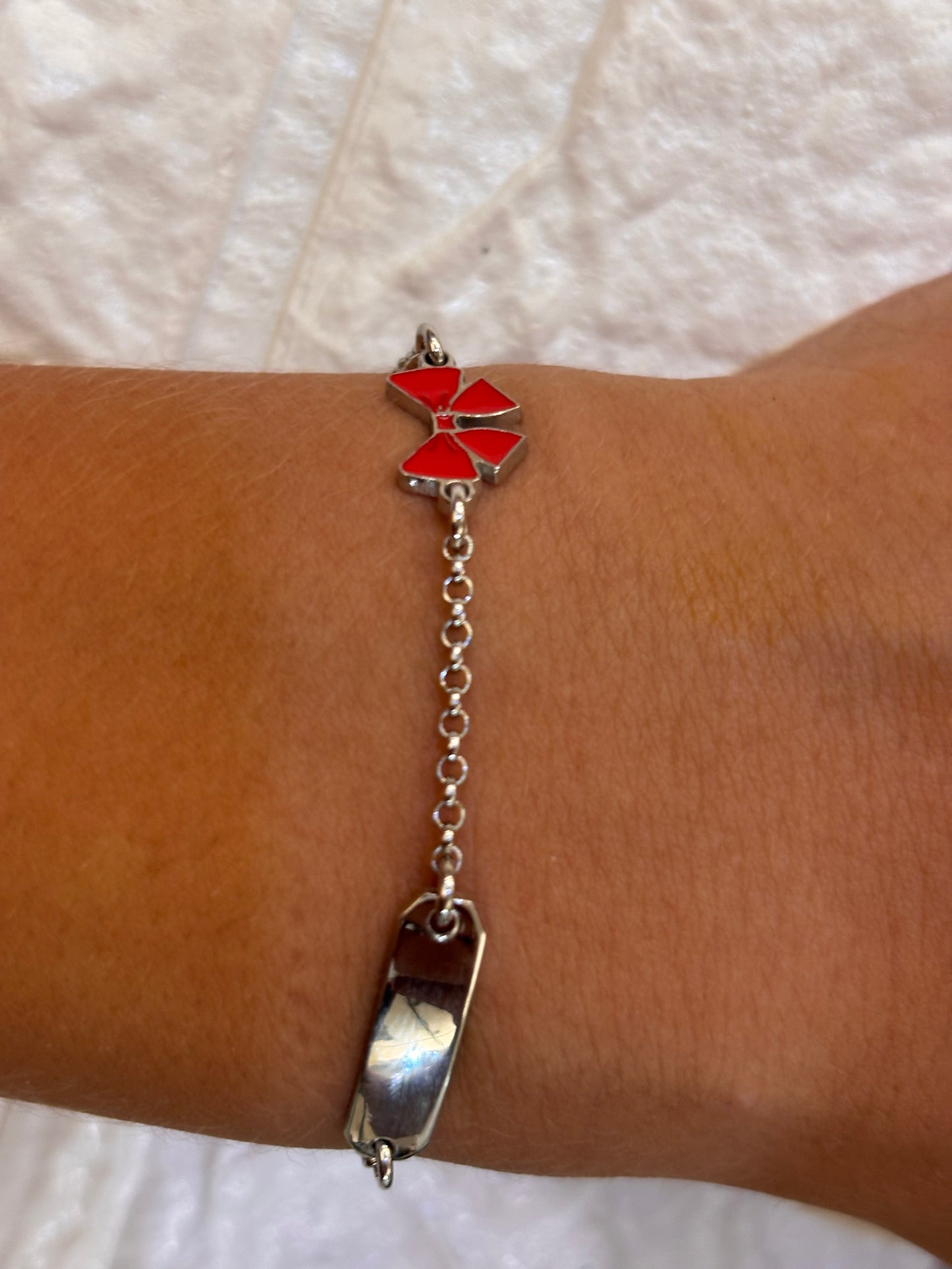 Bracciale Bimba ape e fiocco argento