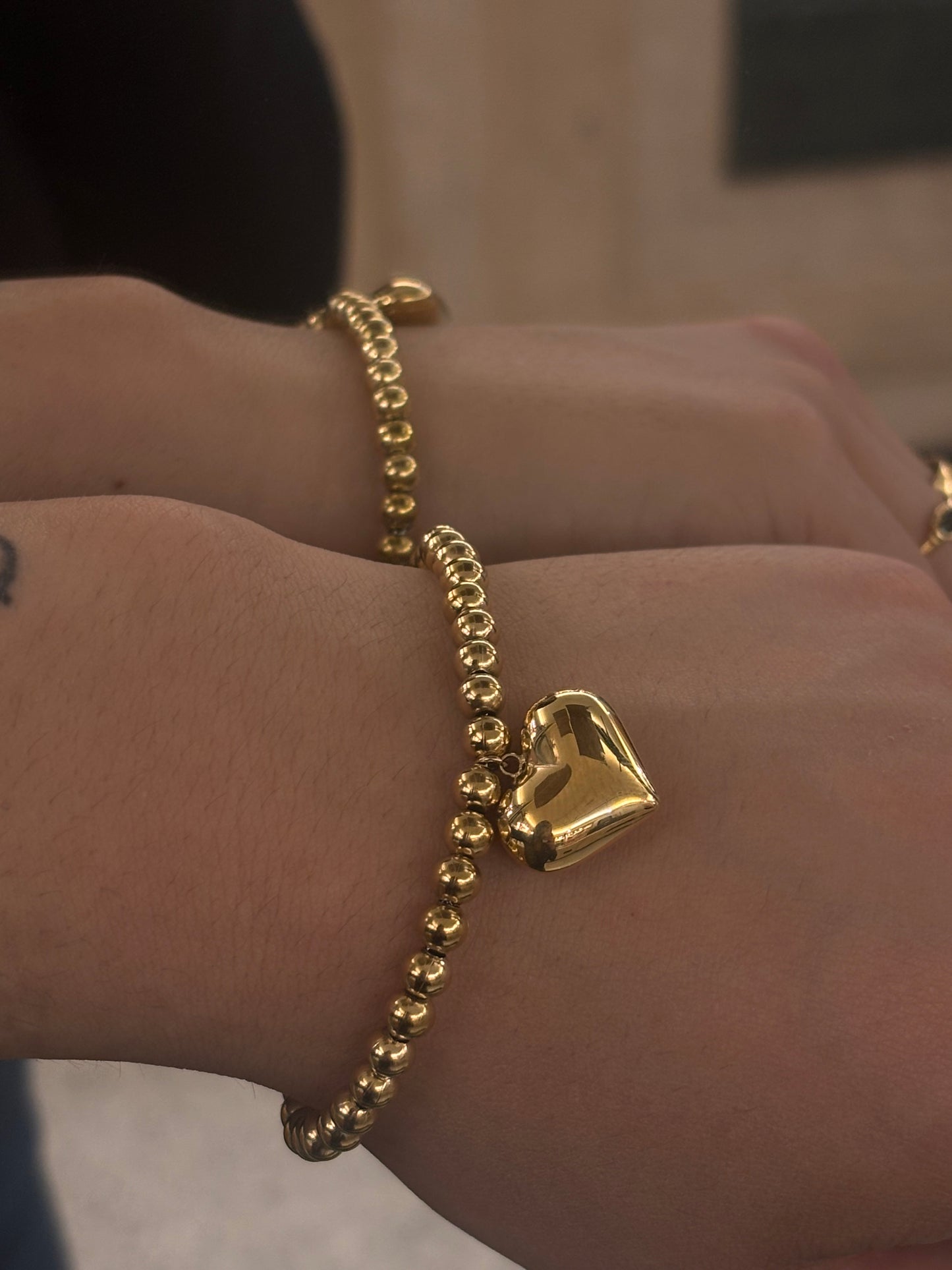 Bracciale Palline e Cuore Pendente