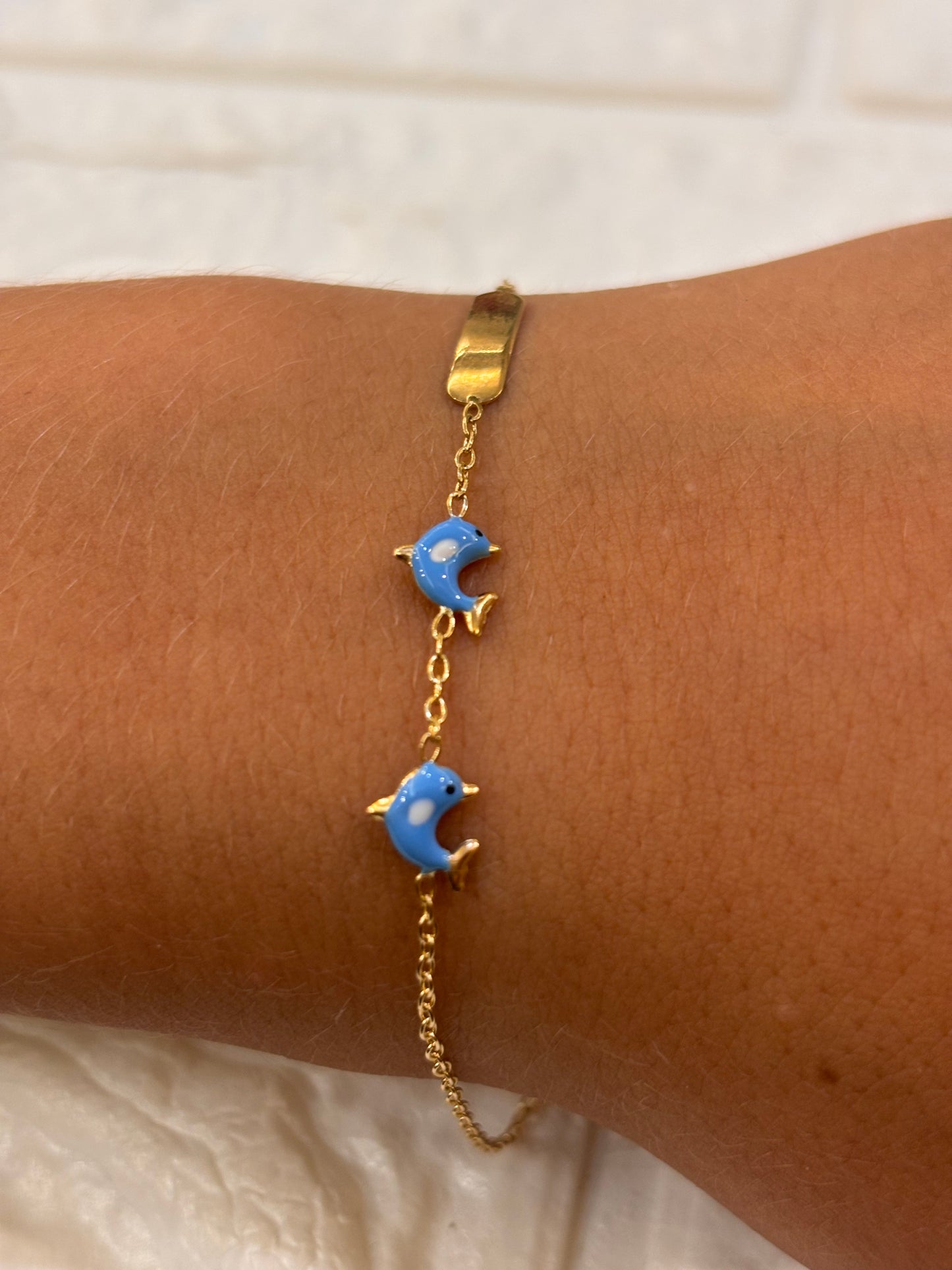 Bracciale Bimbo Oro 18 carati con delfini e targa