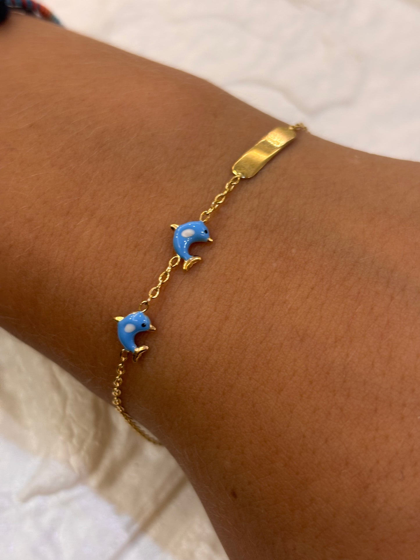 Bracciale Bimbo Oro 18 carati con delfini e targa