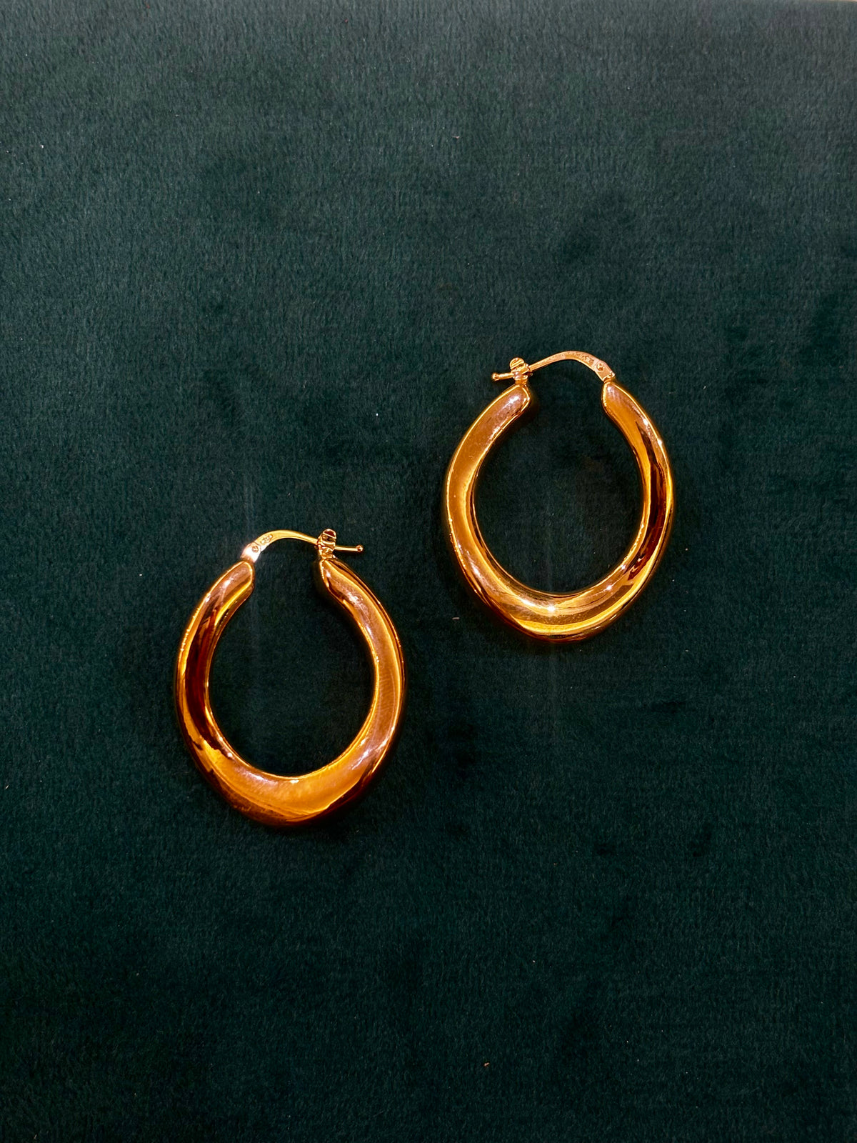 Orecchini oro giallo cerchio ondulato