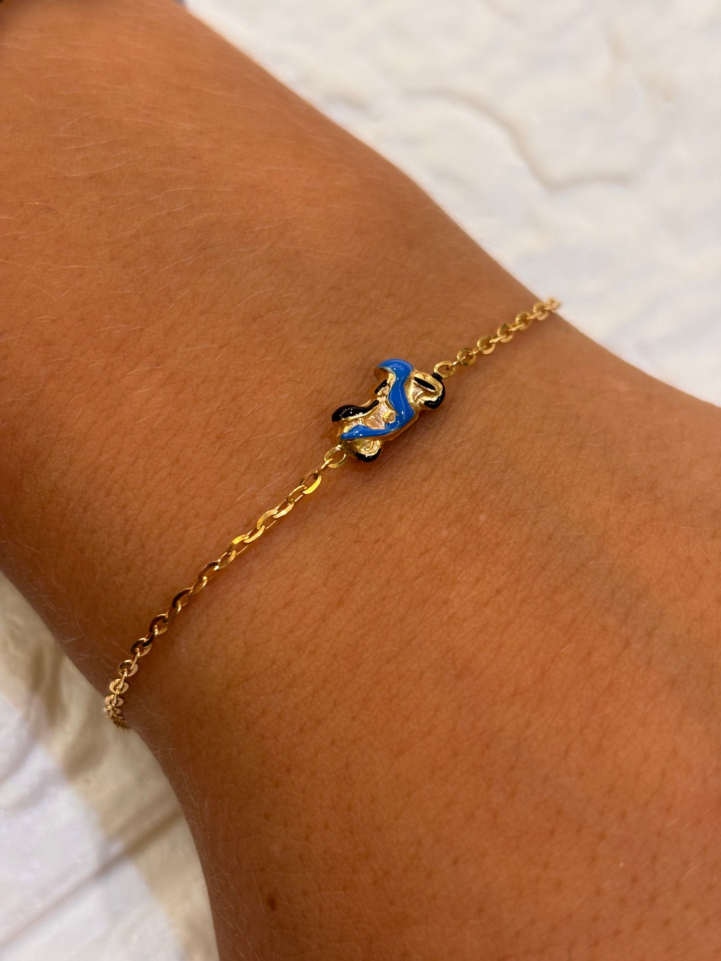 Bracciale Bimbo oro 18 carati moto