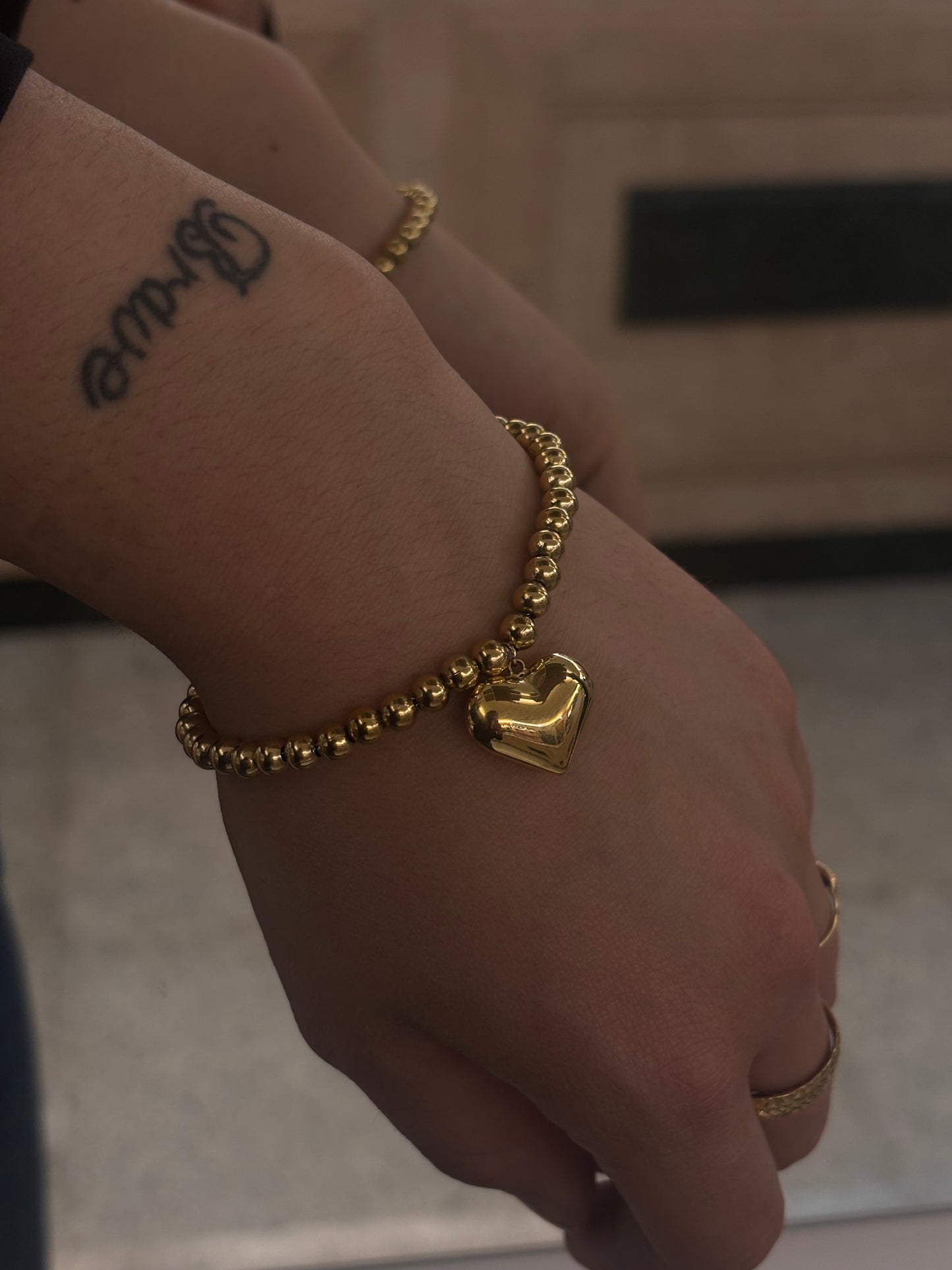 Bracciale Palline e Cuore Pendente