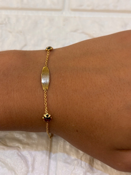 Bracciale Bimbo/a oro 18 carati coccinelle e targa