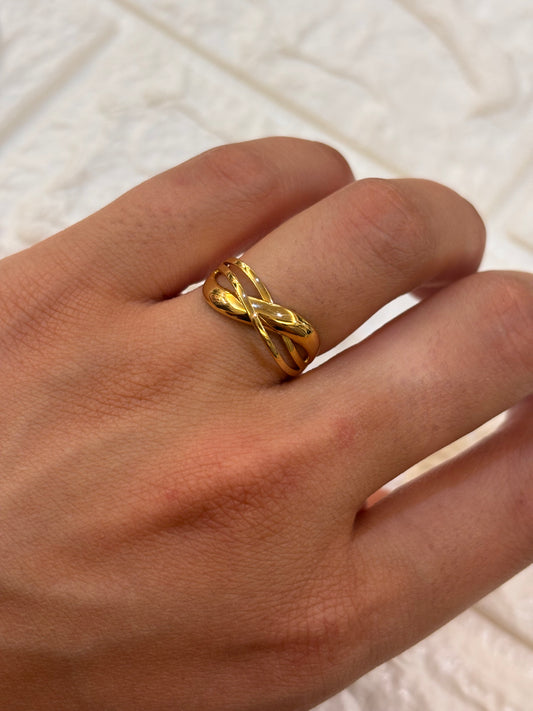Anello Fascia intrecciata Oro Giallo 18 Carati