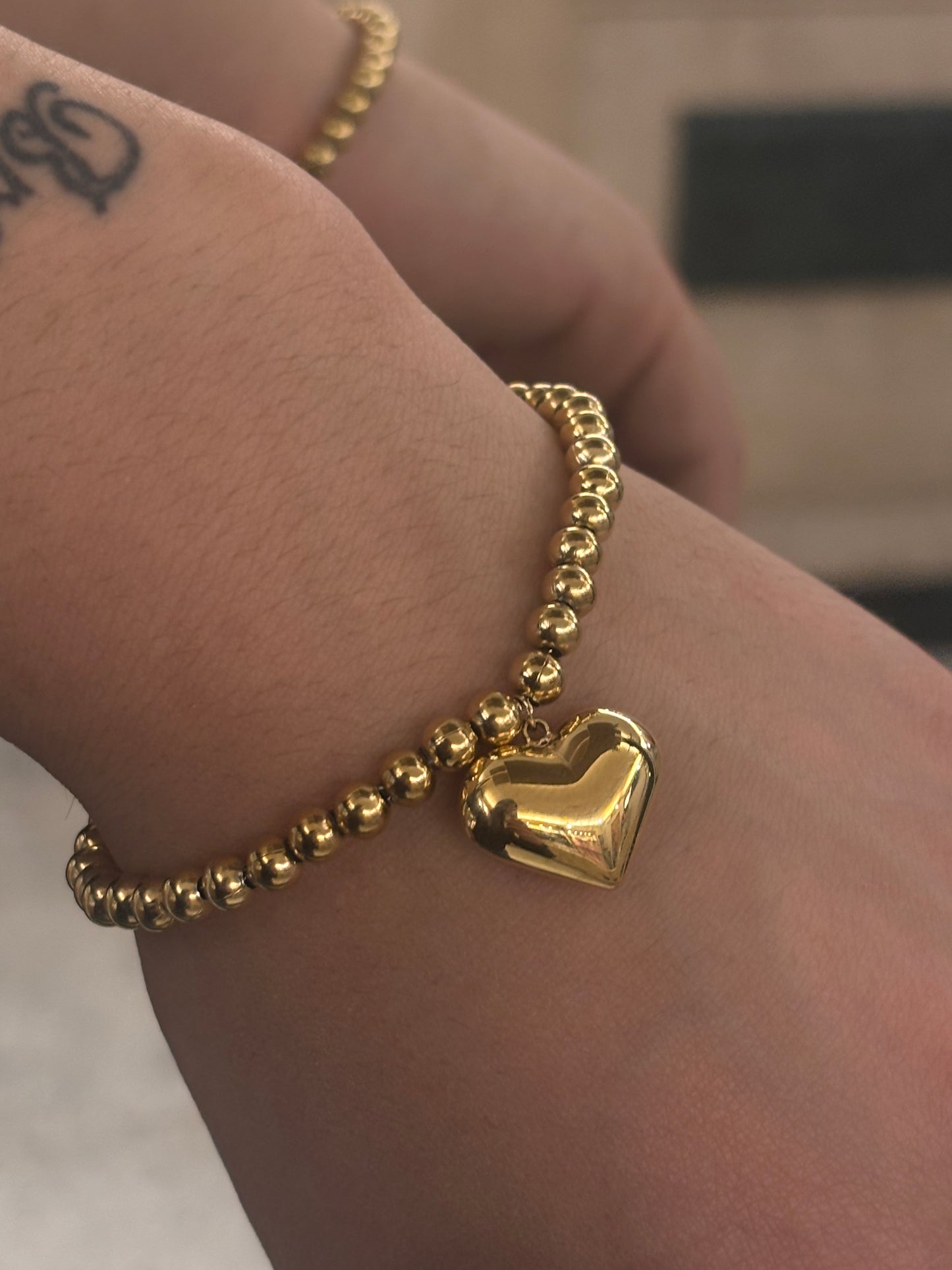 Bracciale Palline e Cuore Pendente