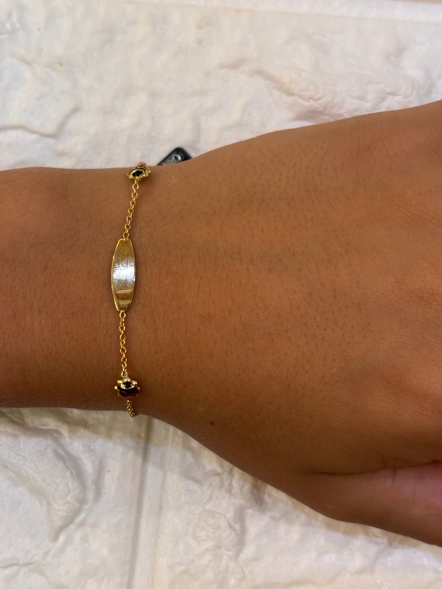 Bracciale Bimbo/a oro 18 carati coccinelle e targa